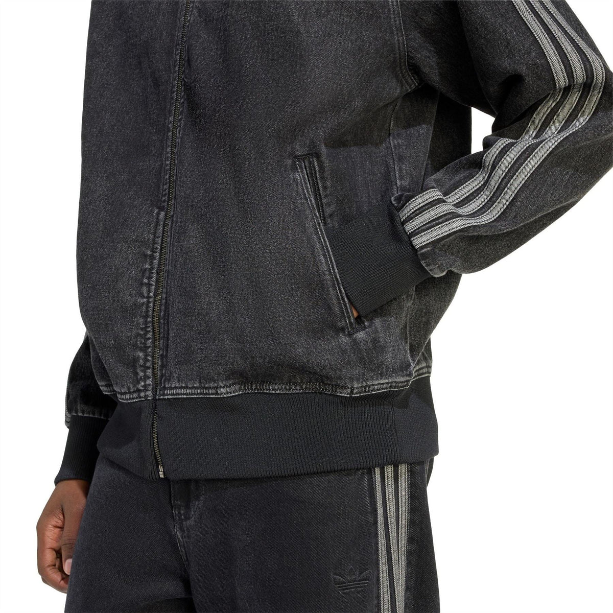 Denim-look athletic top sleeve and pocket detail with striped cuffs and full-zip front