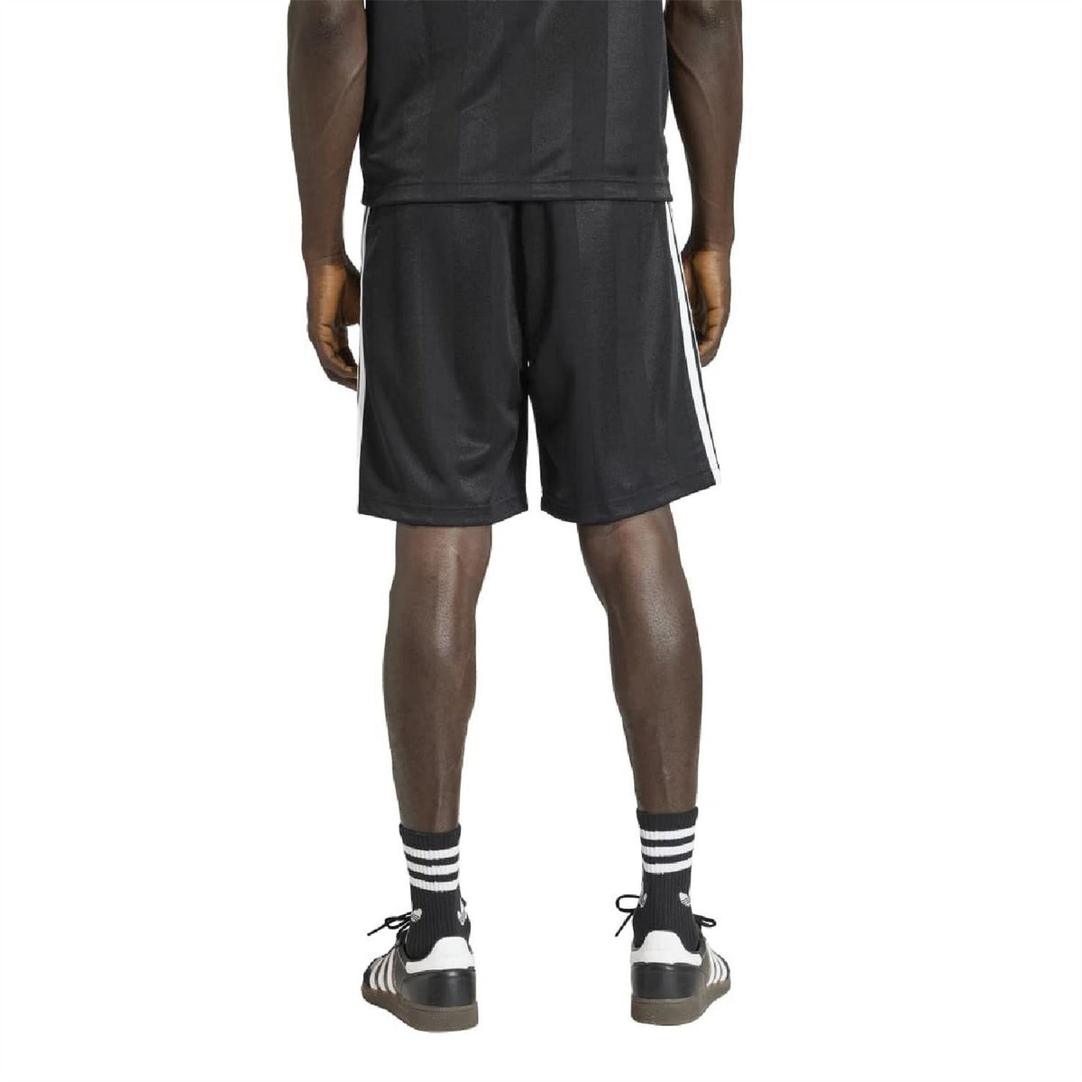 Black loose shorts with white 3-stripe side detailing and elastic waistband