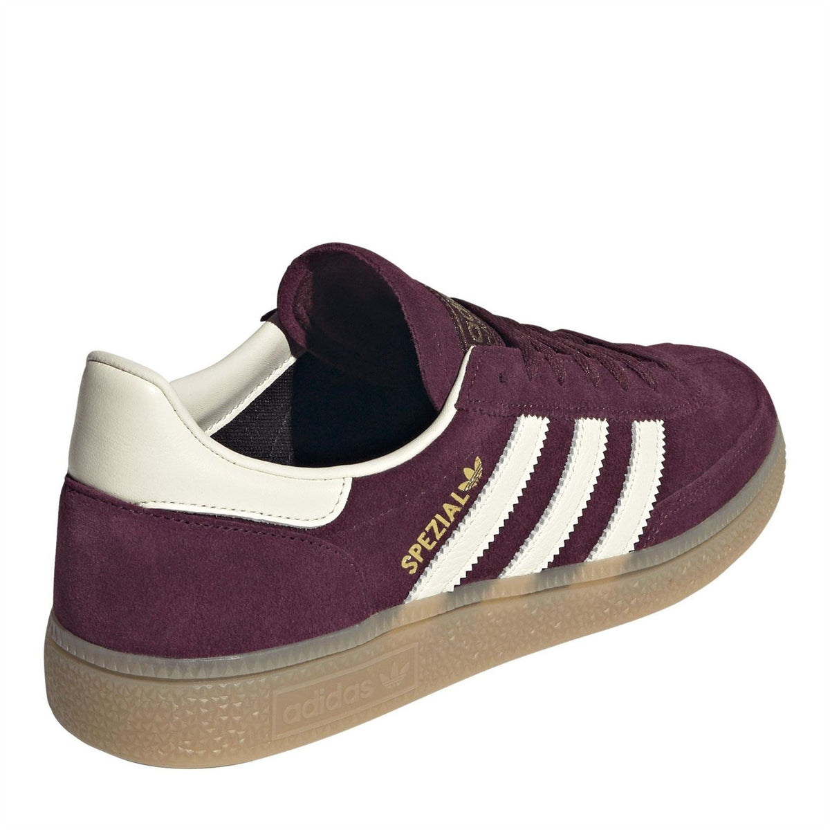 Burgundy canvas low-top sneakers with white heel tab, white stripes, and gum sole