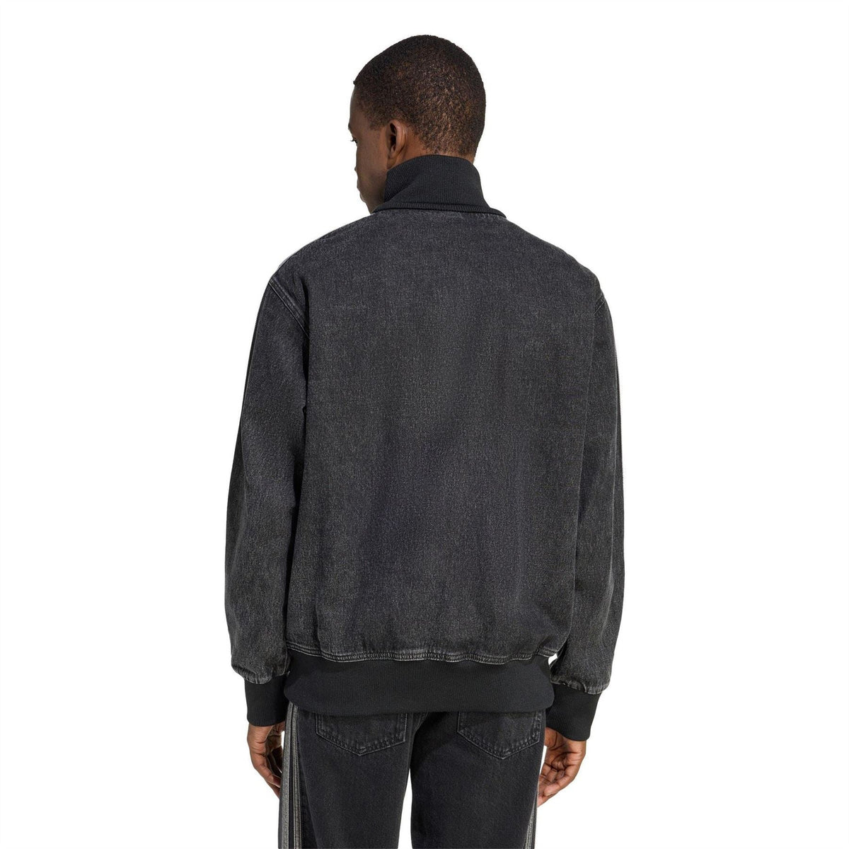 Back view of dark denim funnel-neck athletic top with striped sleeve detailing