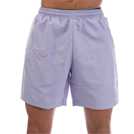 adidas Originals lockup swim shorts with elasticated waistband, navy blue color, front view, casual swimwear for men