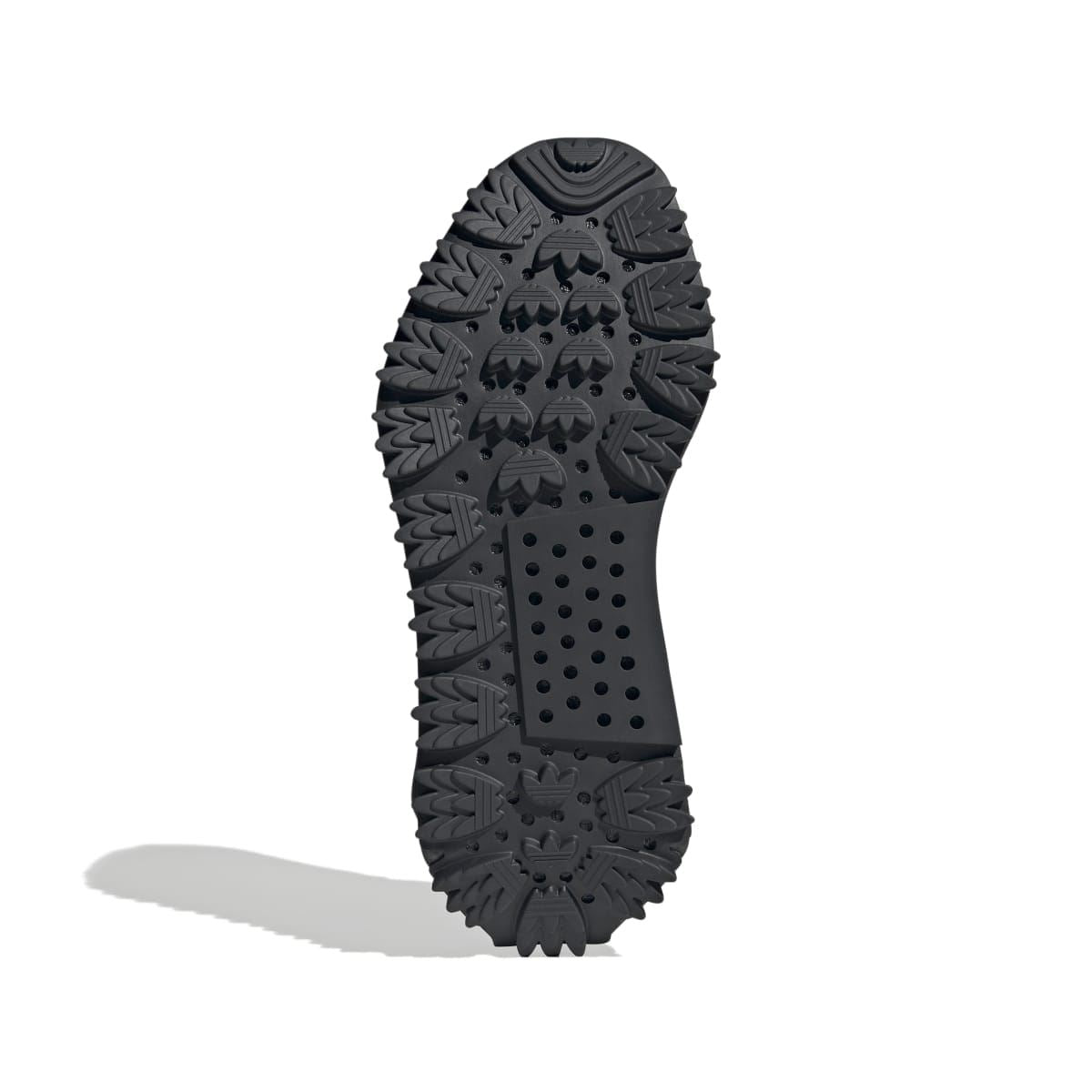 Black outsole of adidas NMD_S1 knit trainers with multi-lug tread pattern