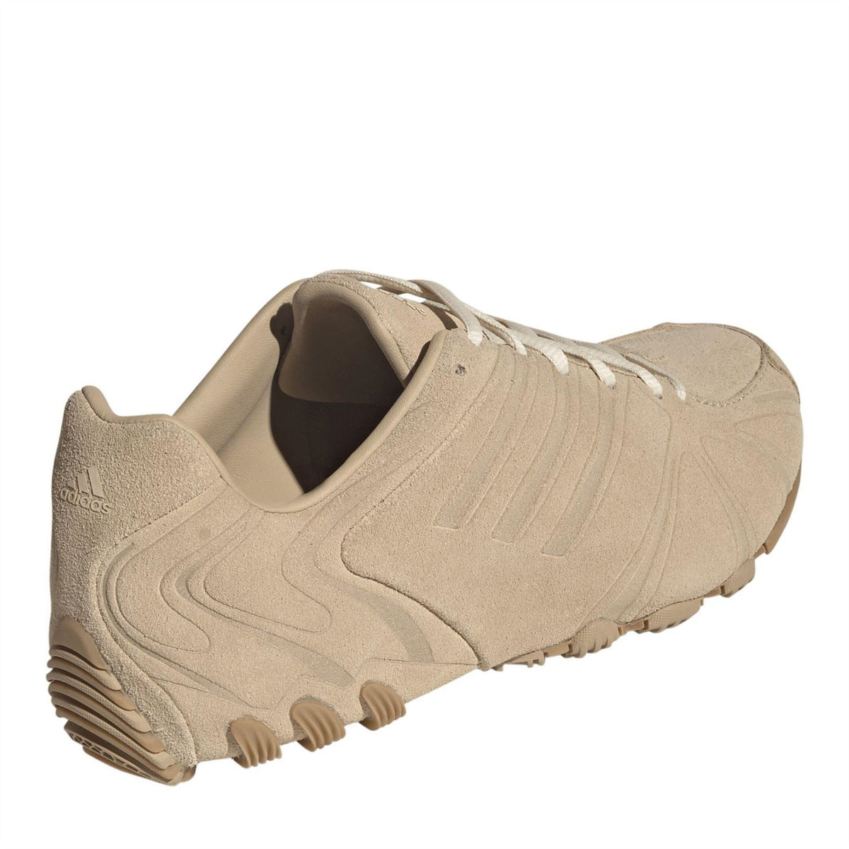 Beige lace-up trainer with padded collar, textured upper, and chunky rubber outsole