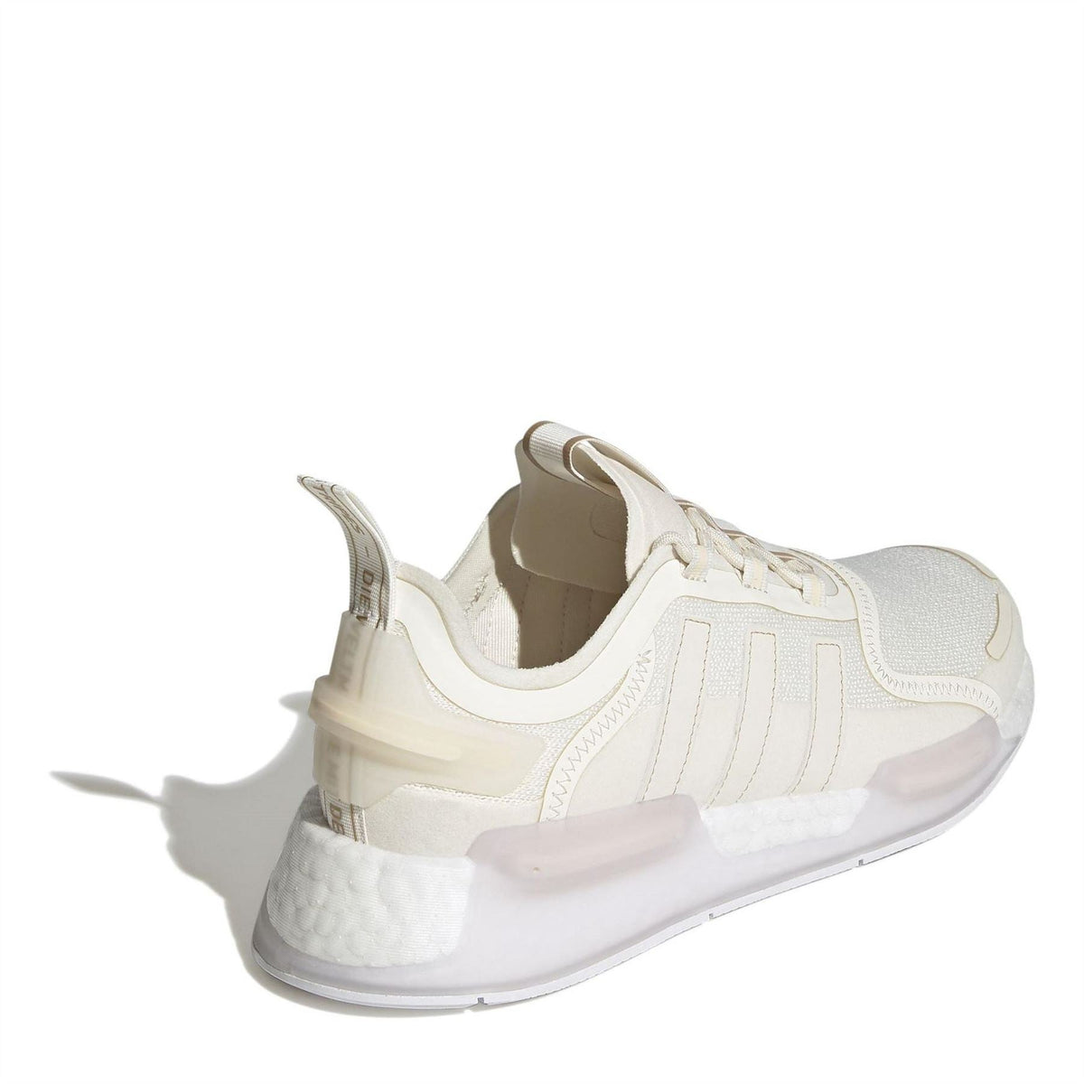 adidas Originals low-top trainers in light white, rear view with heel tab and cushioned sole