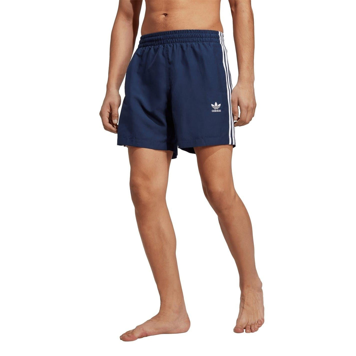 adidas Originals Ori 3 Stripes swim shorts featuring a lightweight fabric, classic three stripes design, and an elastic waistband.