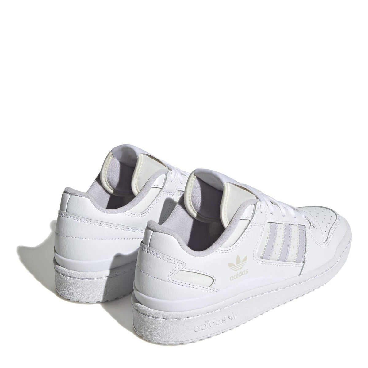White low-top sneakers from back angle with padded collar and heel branding