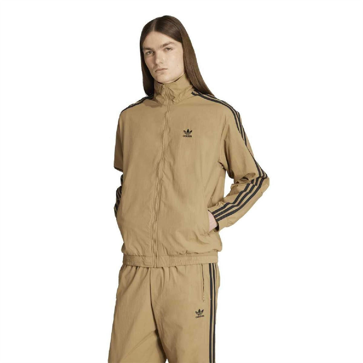 Tan track jacket top with high neck, full zip, long sleeves, and navy sleeve stripes.