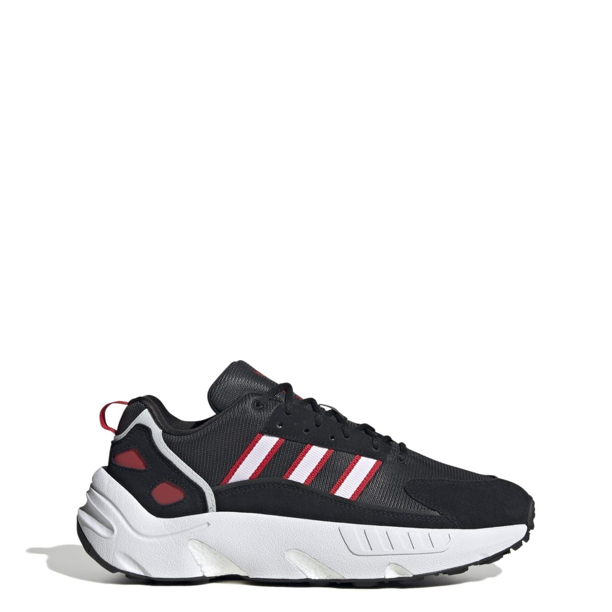 Black ZX 22 Boost trainers with red and white adidas stripes and cushioned white sole