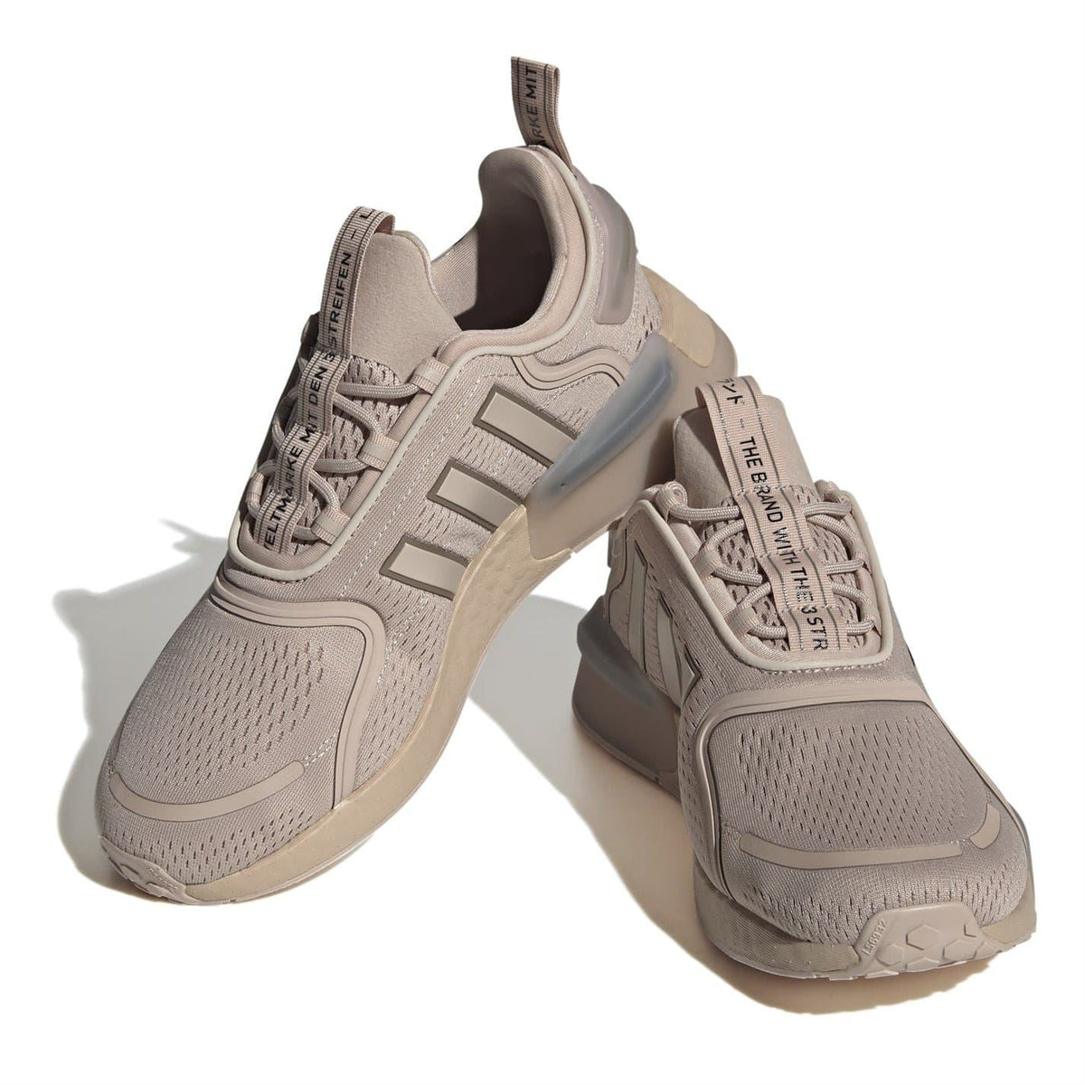 Light beige NMD V3 low-top sneakers with woven laces and padded collar detail
