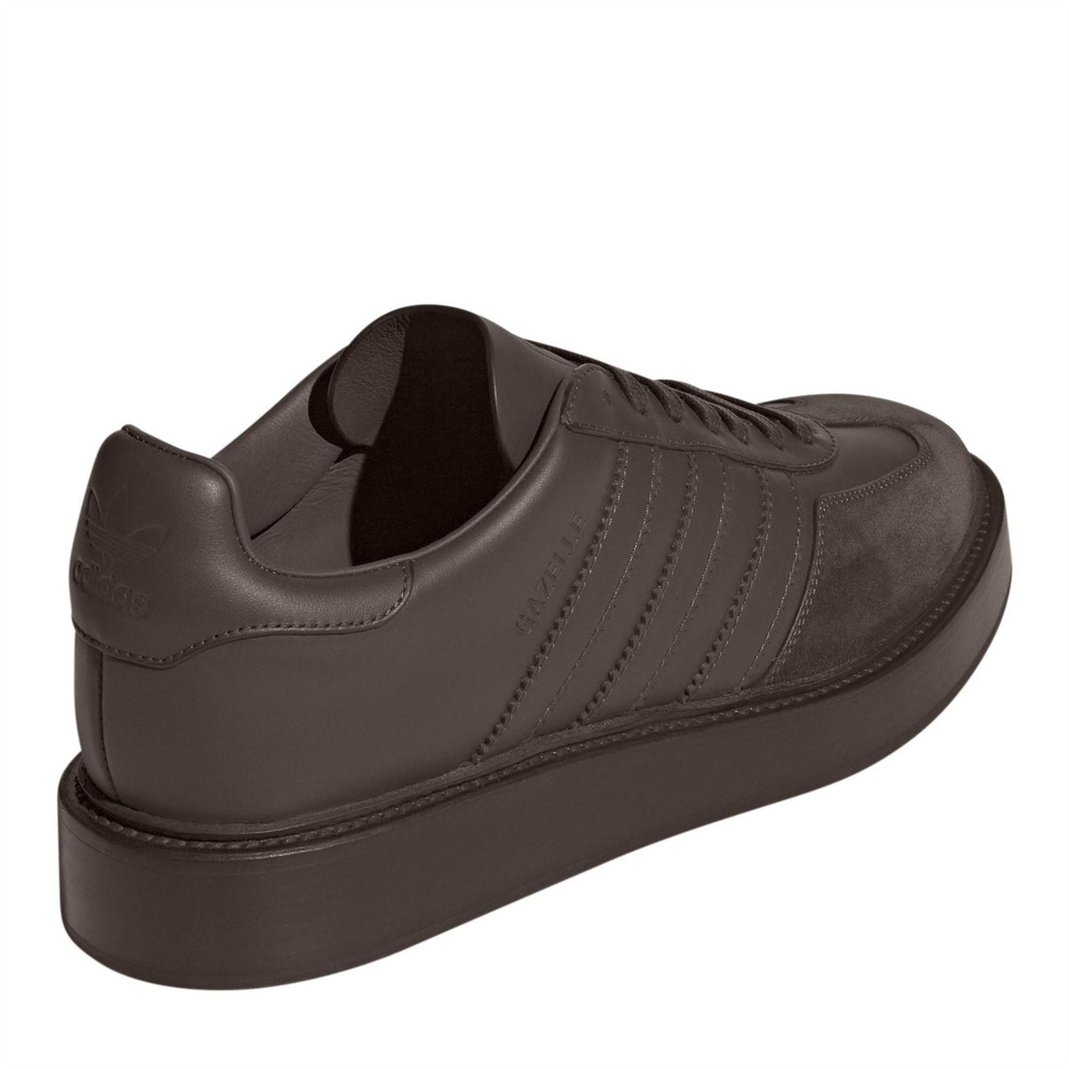 Brown lace-up sneaker heel view with thick rubber platform sole