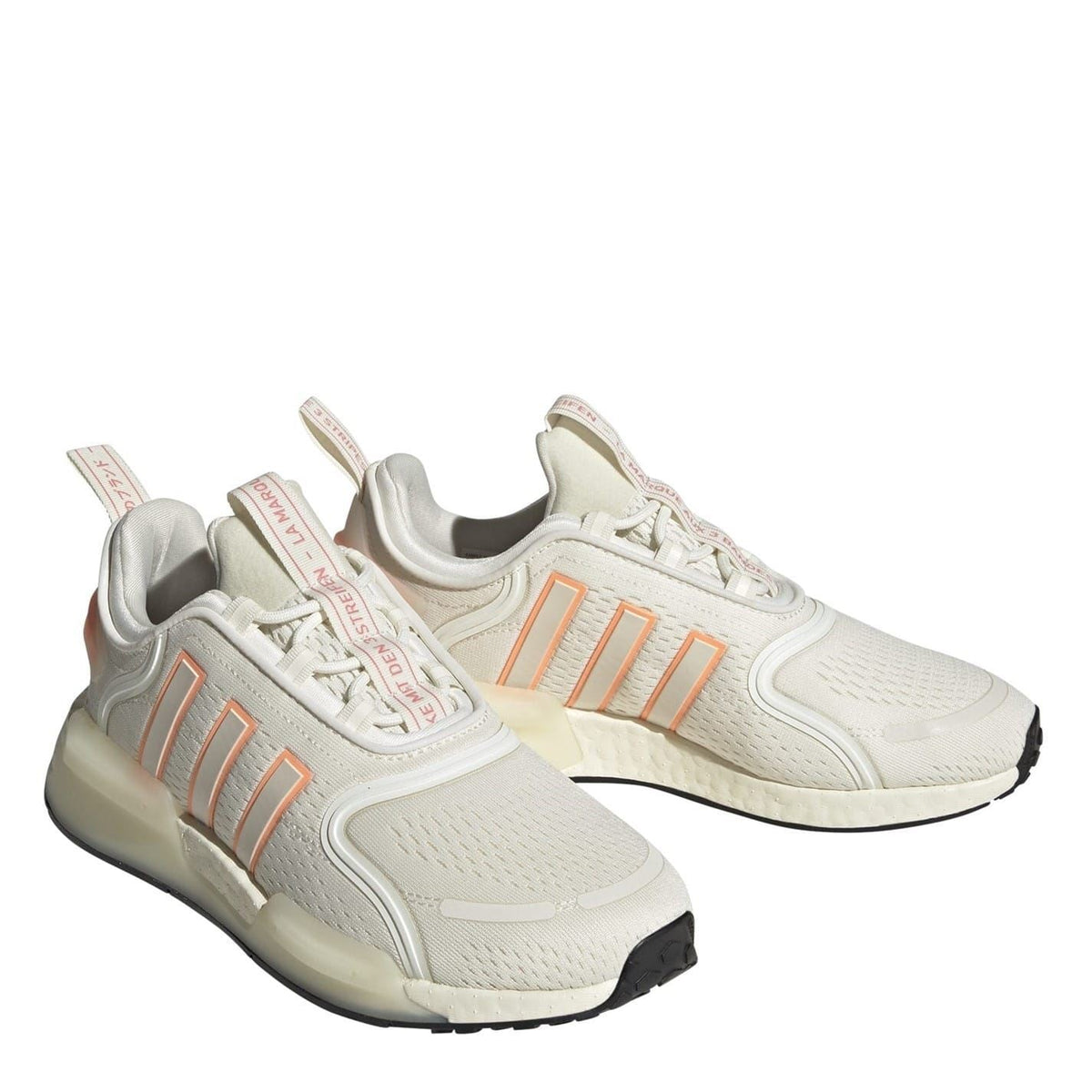 White NMD low-top sneakers, lace-up with orange stripes and molded midsole detail
