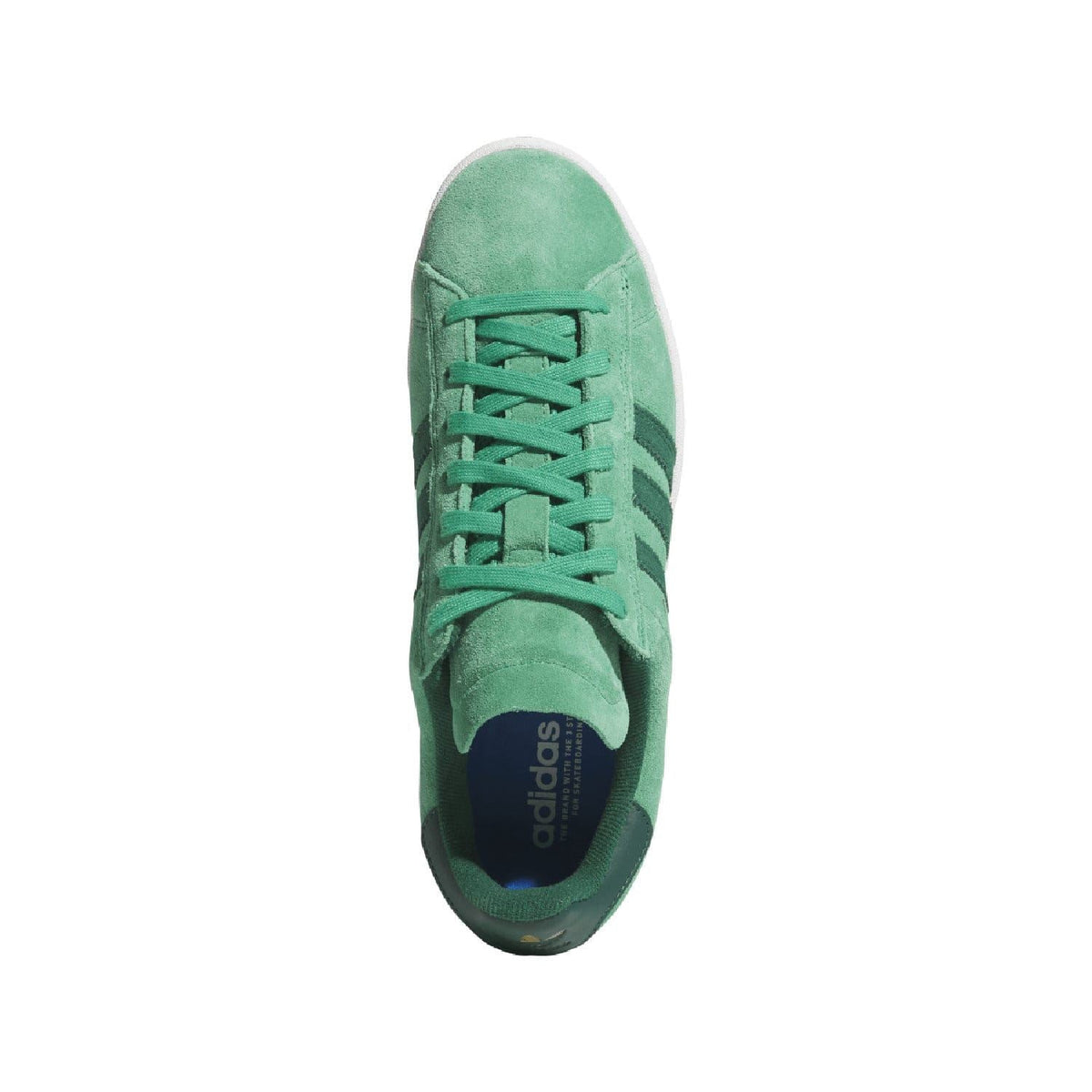 Green suede lace-up trainer showing side profile and rubberized toe panel