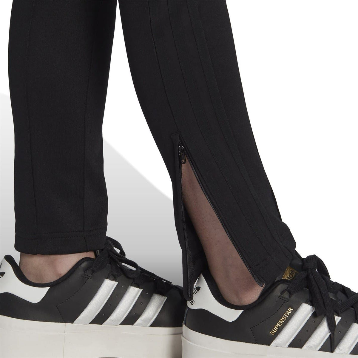 adidas Originals slim fit running athletic joggers in black with tapered legs and elastic waistband, designed for active wear