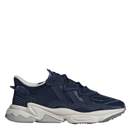 adidas Originals Ozweego low-top trainers with white and grey sneakers, featuring cushioned soles and stylish design.