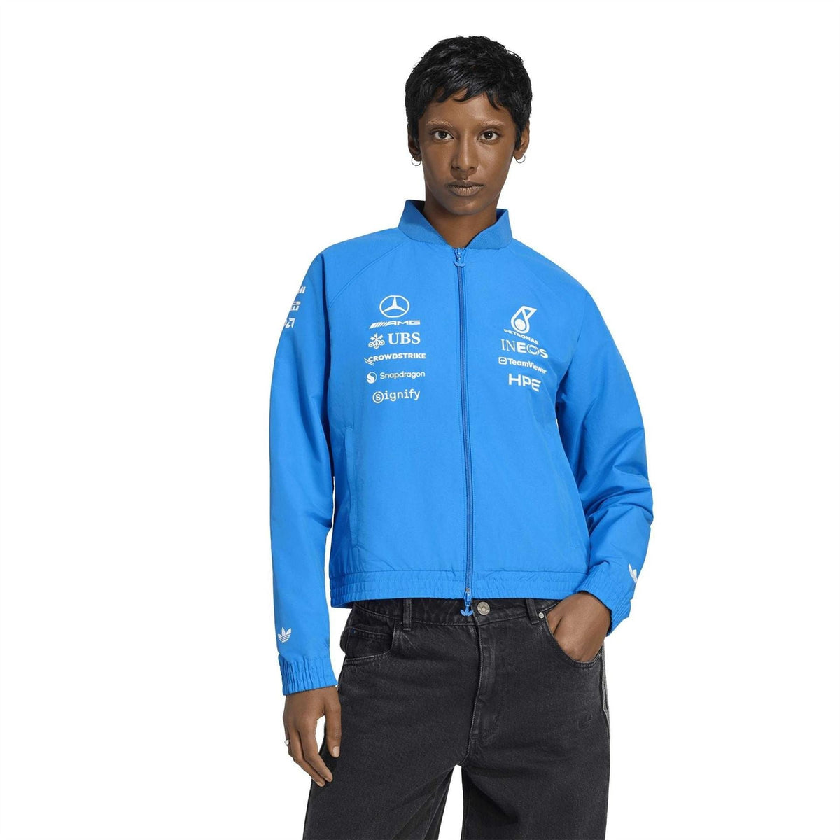 adidas Originals Mercedes blue track jacket, full-zip stand collar, worn with dark jeans