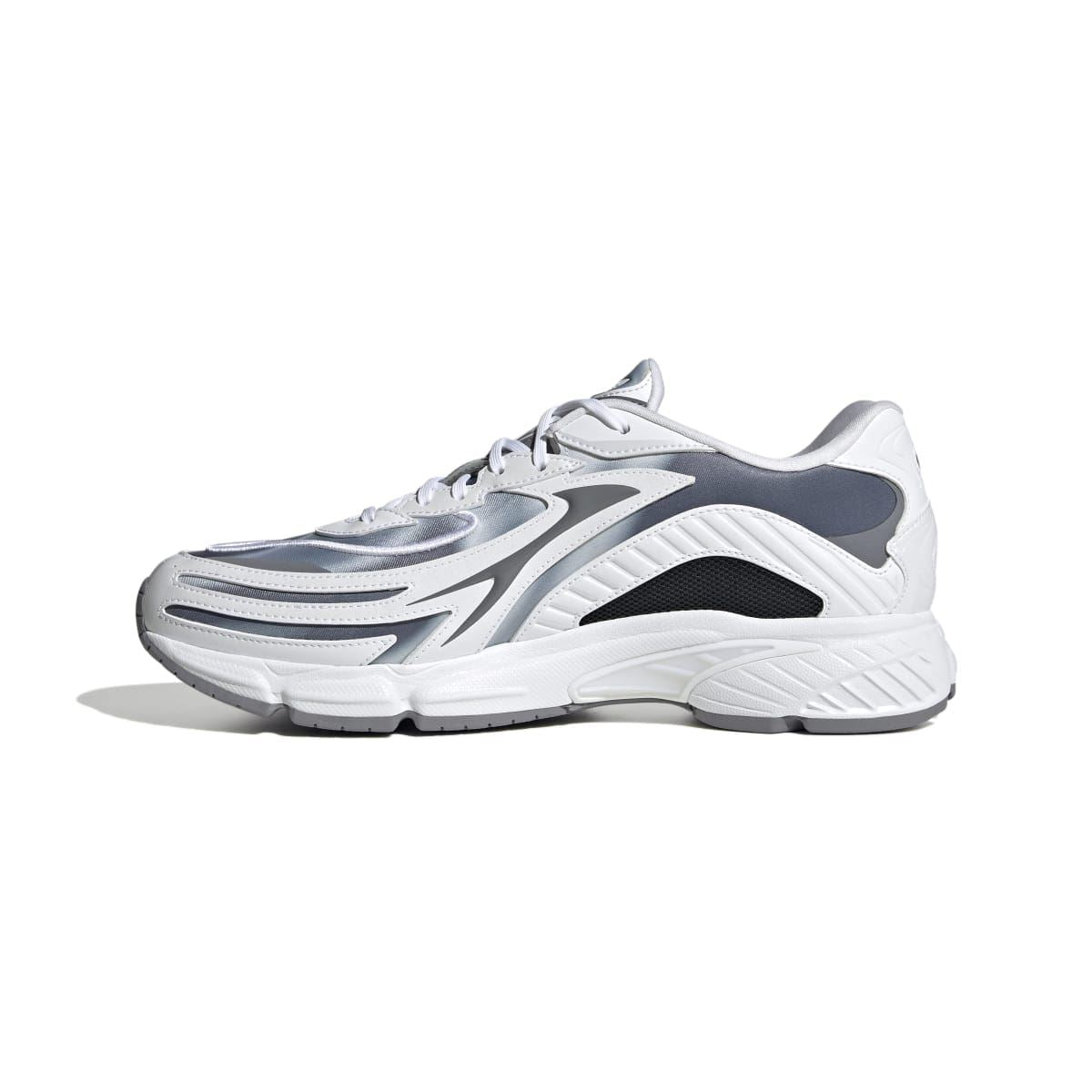 White and grey lace-up sneakers, 3/4 side view with textured midsole and stripes
