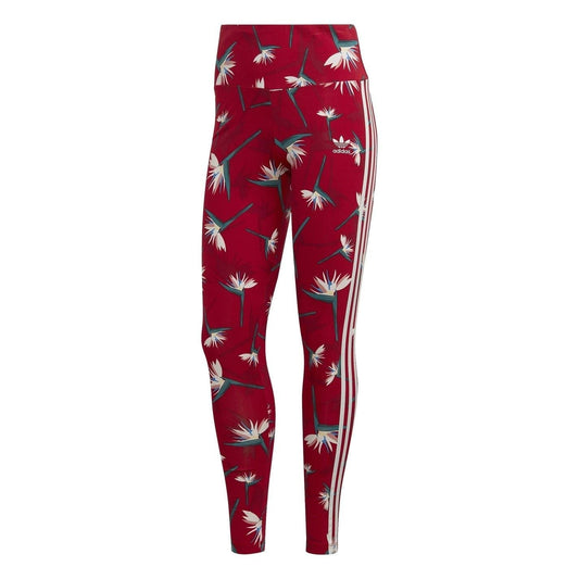 Red adidas leggings with tropical leaf and flower print, side three-stripe accents