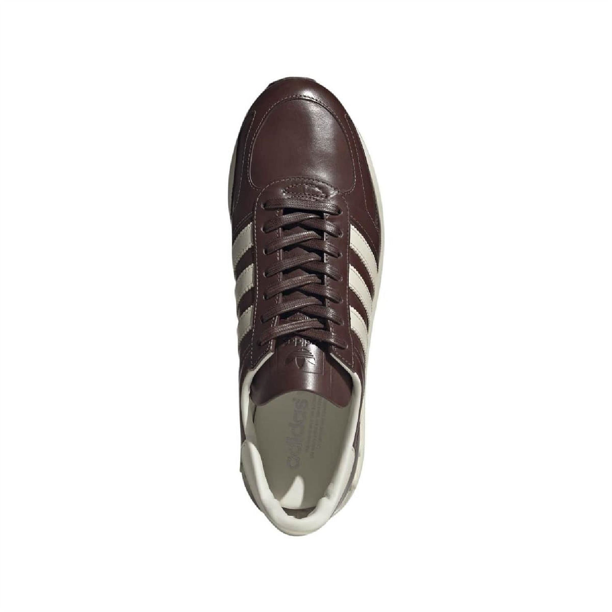 Dark brown leather sneaker side view with lace-up closure and white heel lining