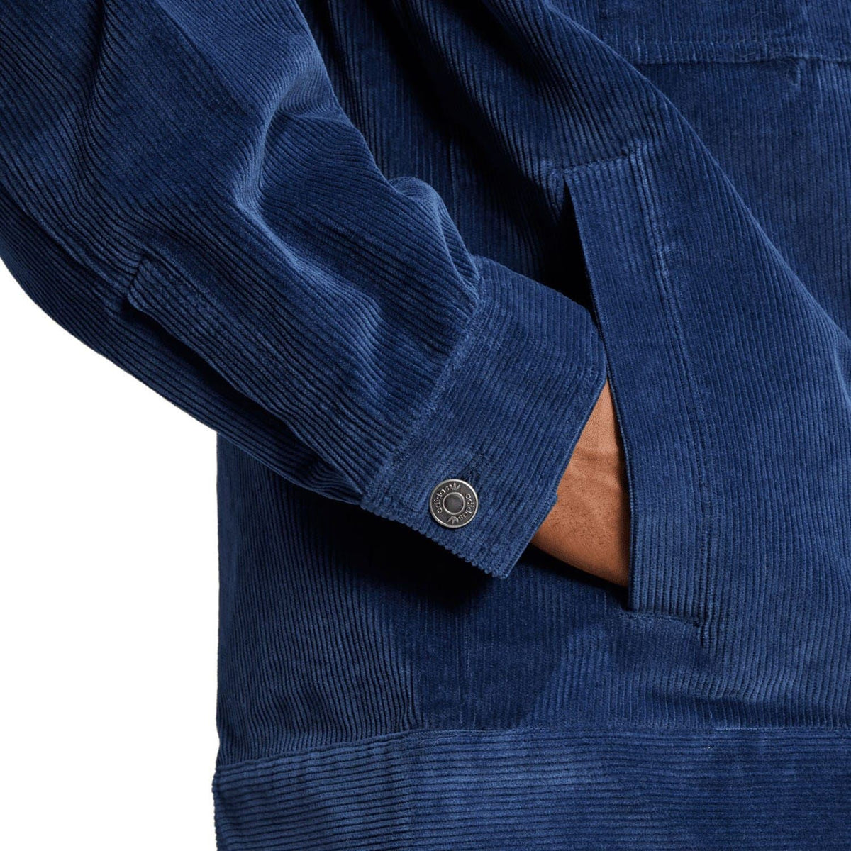 Indigo corduroy overshirt sleeve detail with logo button