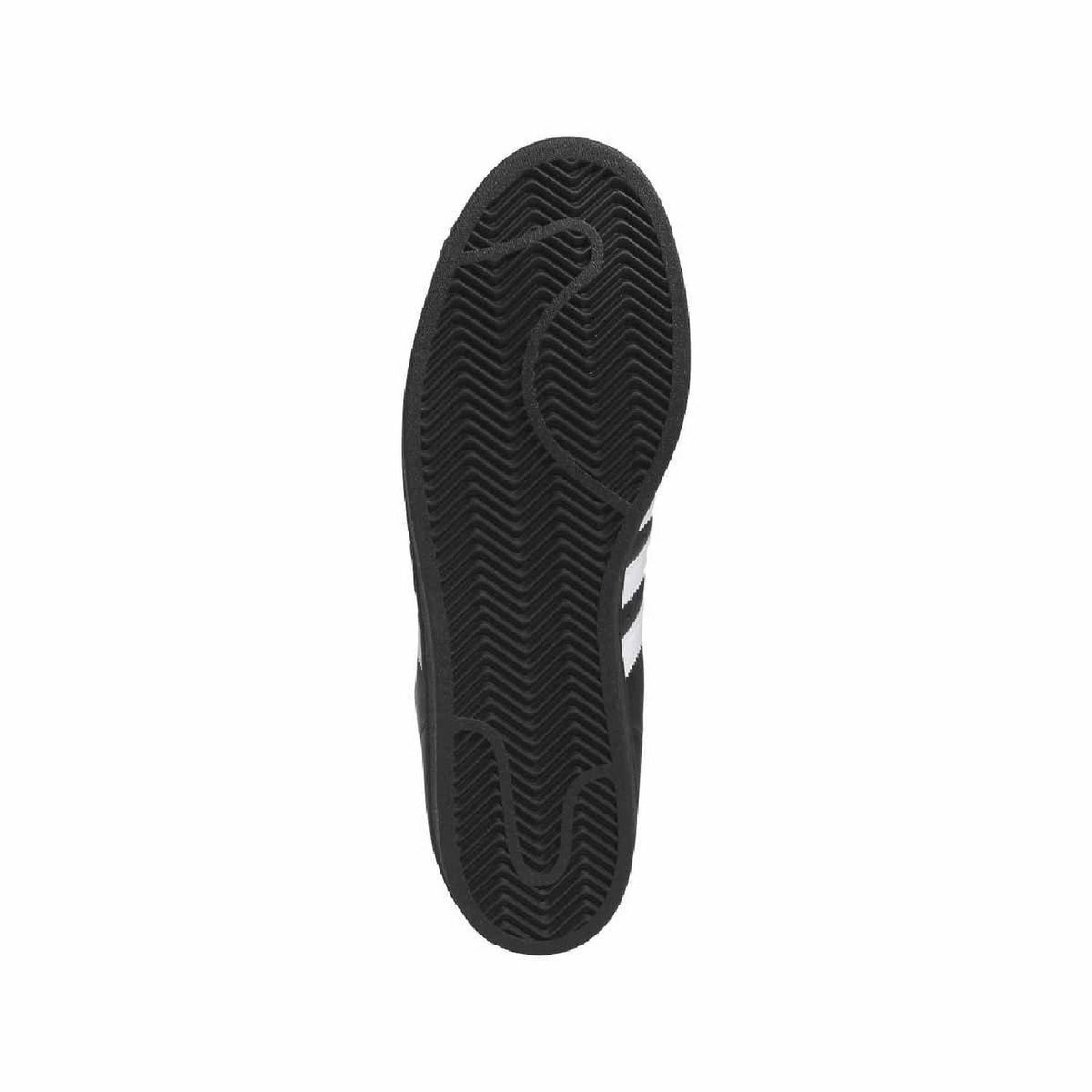 Black rubber outsole with textured herringbone tread