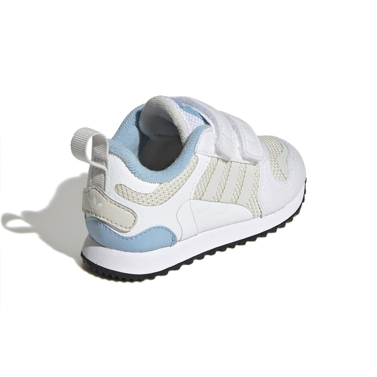 Infant white trainers with light-blue heel and side panel, showing padded collar and sole