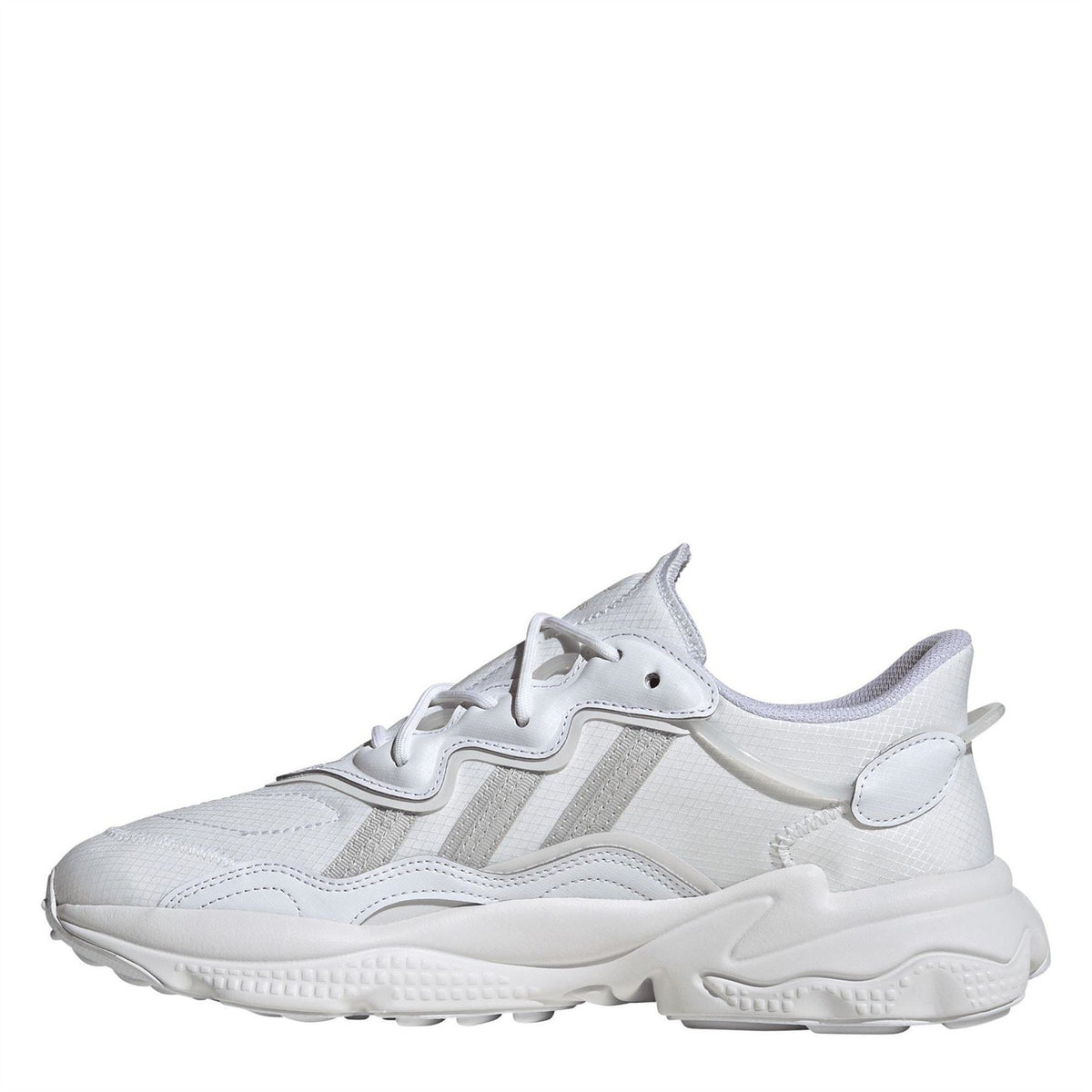 adidas Originals Ozweego low-top trainers in white with chunky sole and mesh details, casual footwear for everyday wear