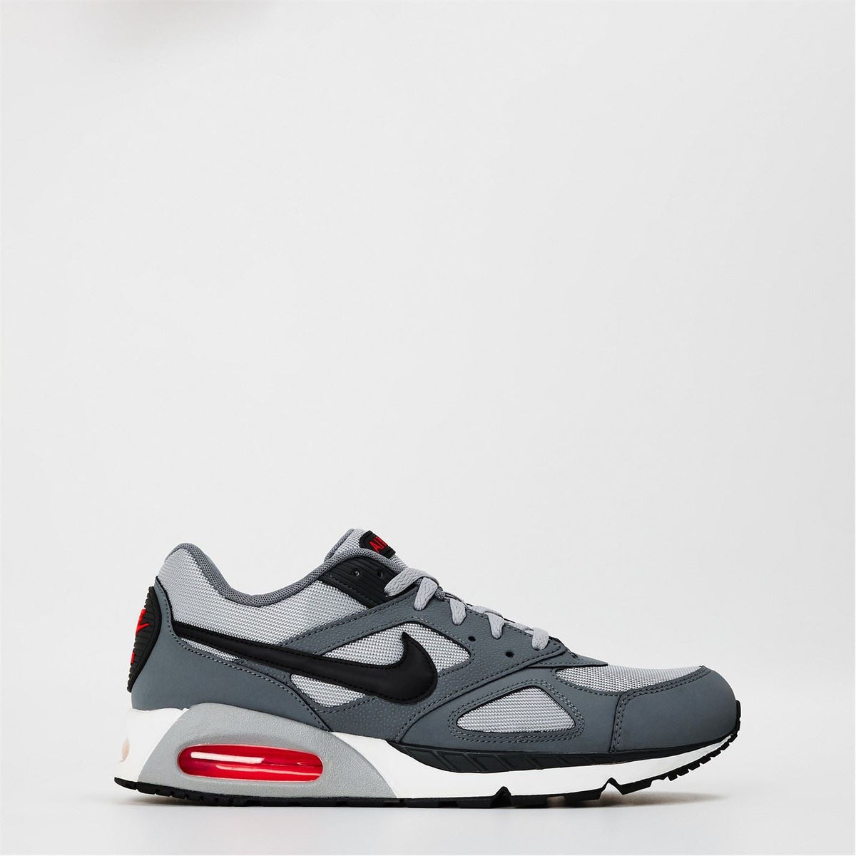 Grey trainers with black Swoosh and red Air heel window, lace-up low profile