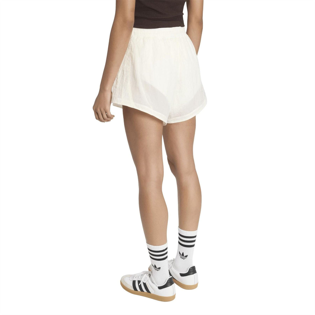 White woven track shorts with elastic waist and drawstring ties, back view