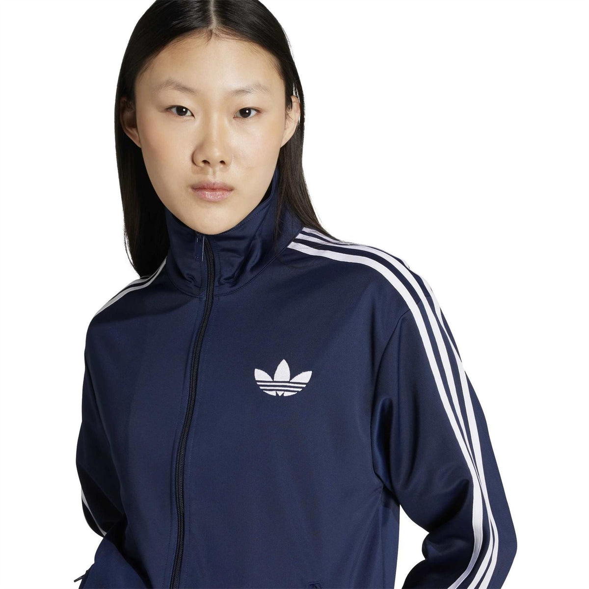 adidas Originals funnel-neck track jacket, dark indigo with trefoil logo and striped sleeves