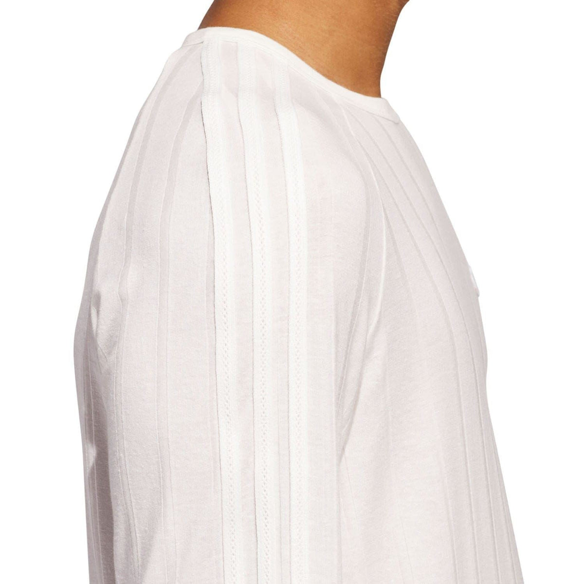 White ribbed long-sleeve t-shirt side view, cuff and shoulder seam visible