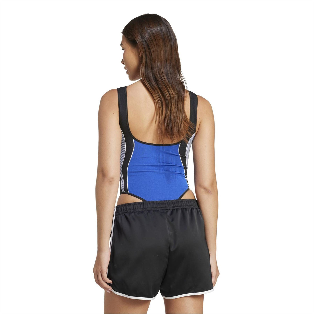 Blue one-piece swimsuit body with racerback straps and black side trim, worn with black shorts