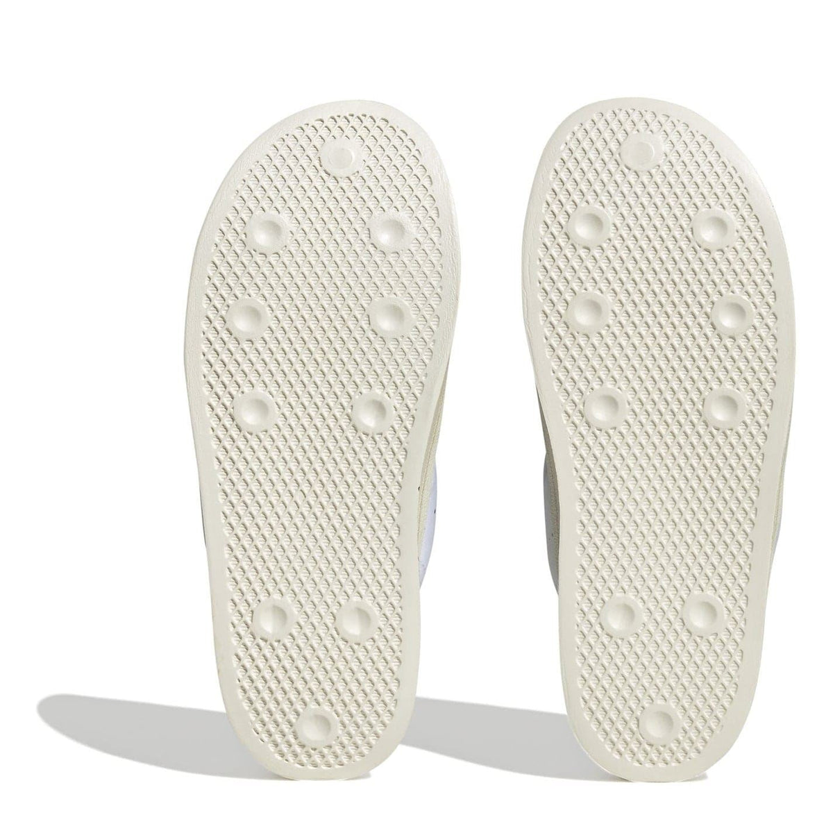 adidas Originals Puffy Spr trainers featuring three white stripes and a puffy, cushioned design for casual wear.