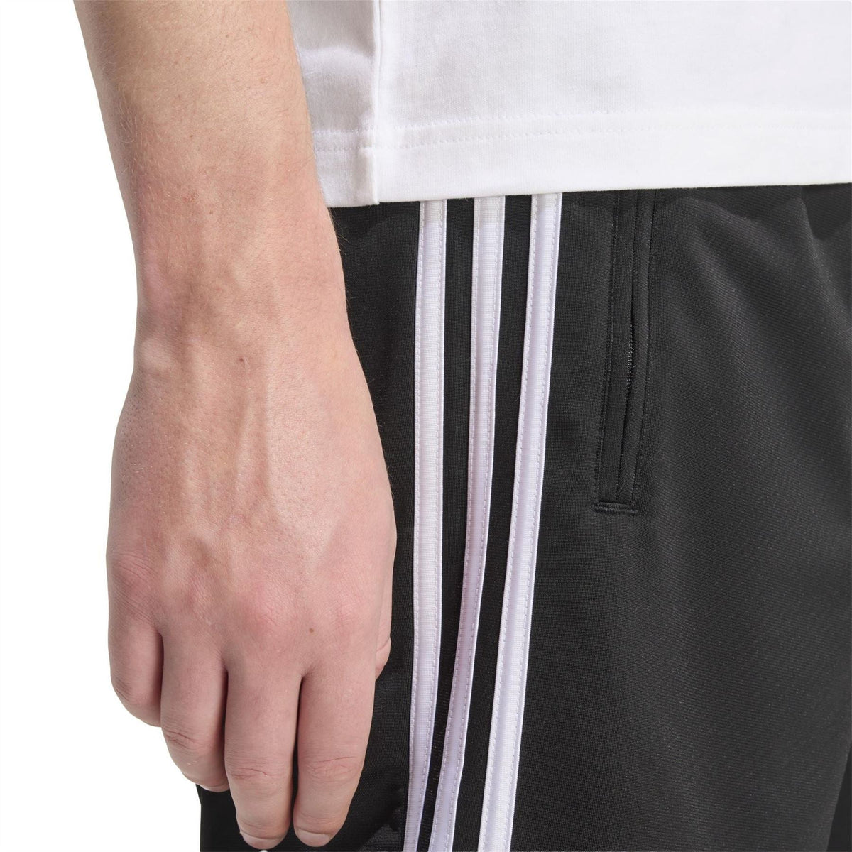 Black shorts with white vertical stripe detail and side seam pocket