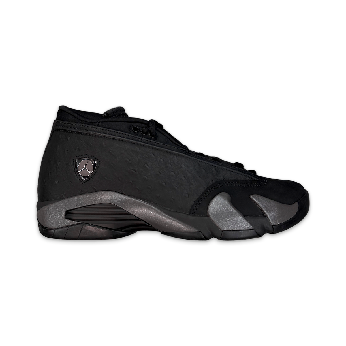 Black low-top Air Jordan 14 sneaker with laces and side pod detail