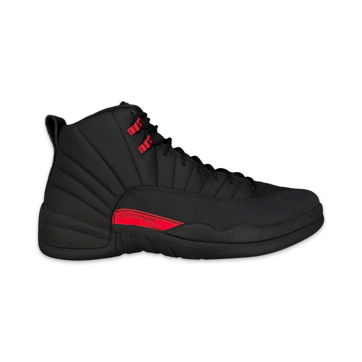 Black high-top Air Jordan 12 Retro Bloodline basketball shoe with red lace accents
