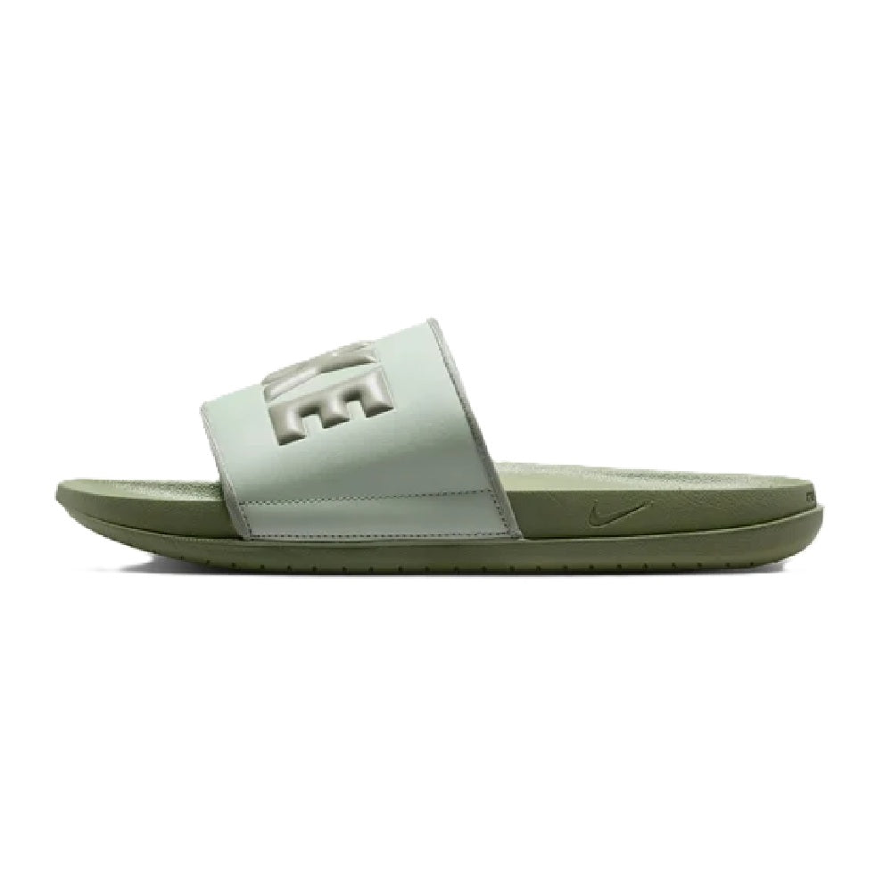 Nike Offcourt slide sandal with mint strap and embossed logo; green sole