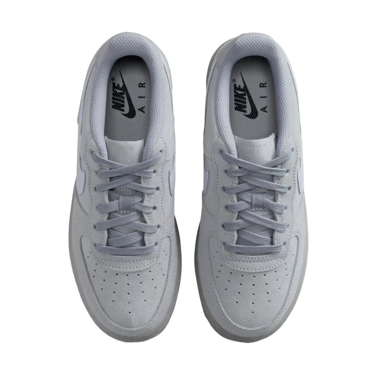 Big kid's Nike Air Force 1 sneakers, front view with lace-up and Nike Air label inside.