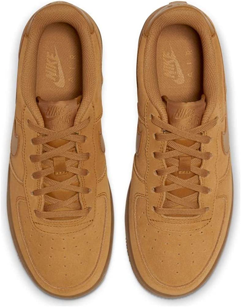 Big kids' Nike Air Force 1 sneakers, wheat color, lace-up fronts, perforations.
