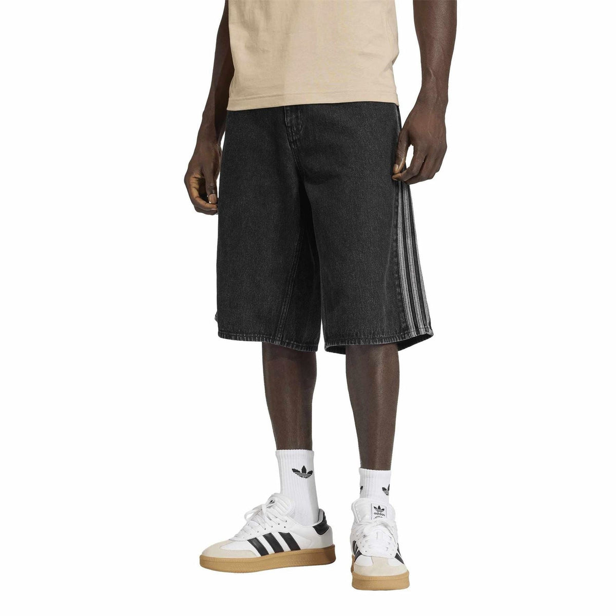 Dark denim shorts with side stripe detail, mid-thigh length and five-pocket styling