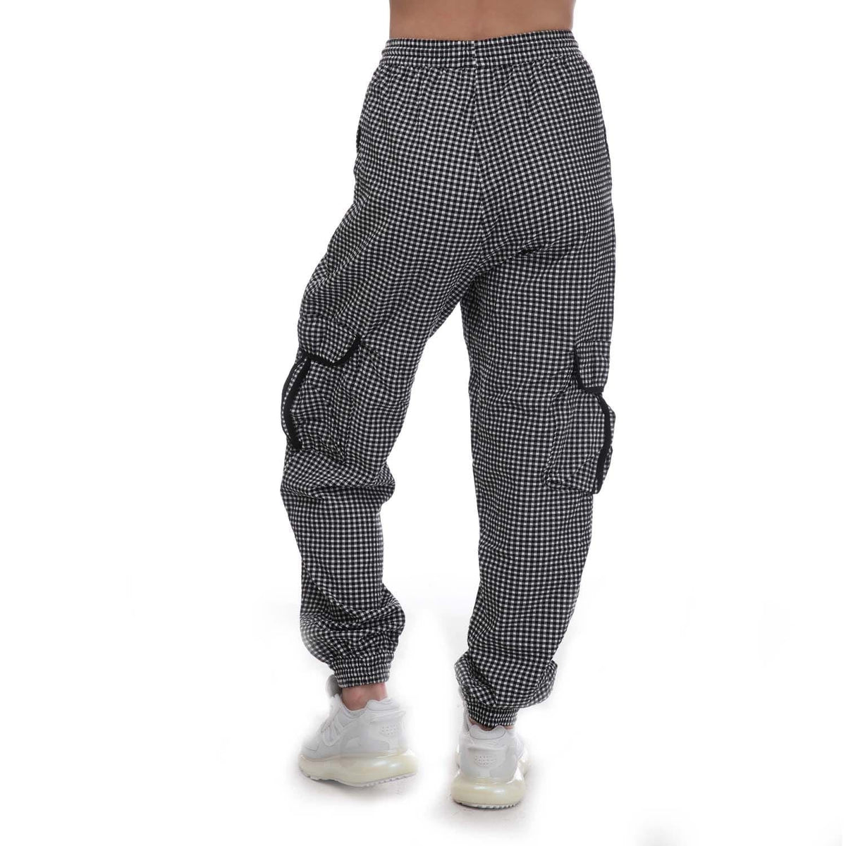 adidas Originals Gingham Track Pants, stylish black and white checkered trousers with tapered fit and elastic waistband.