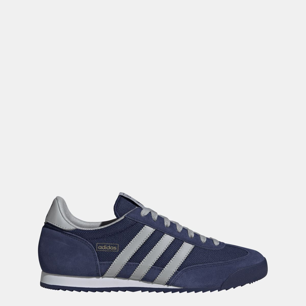 adidas Originals R71 Shoes in white and black with classic sneaker design and brand logo on the side, casual footwear for everyday wear
