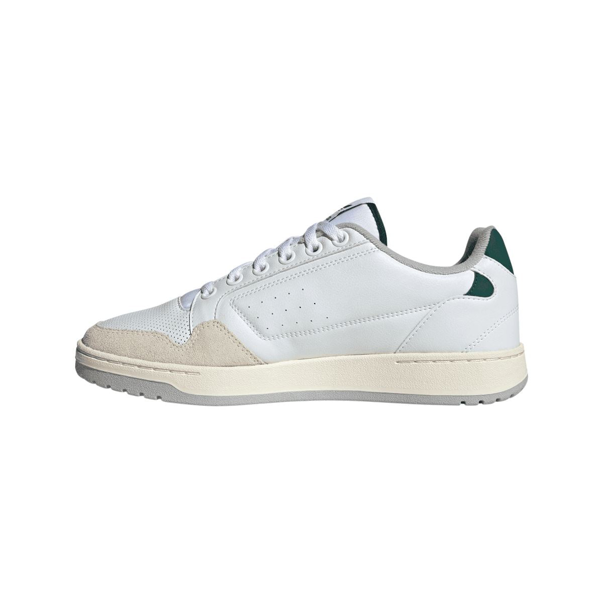 White adidas NY 90 trainers, front side view with green collar lining and beige midsole