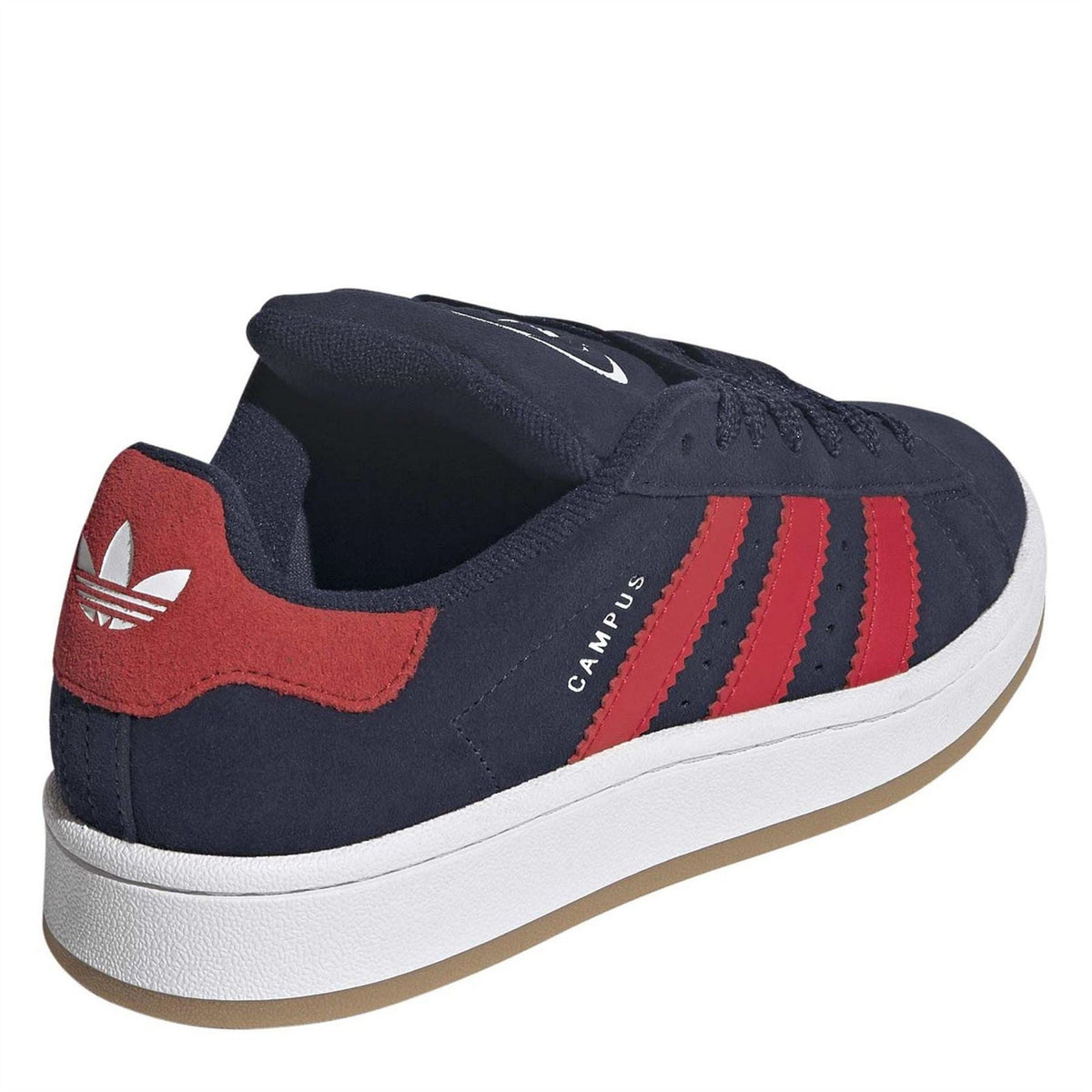 Kids low-top sneakers with red heel panel, navy suede upper and white outsole