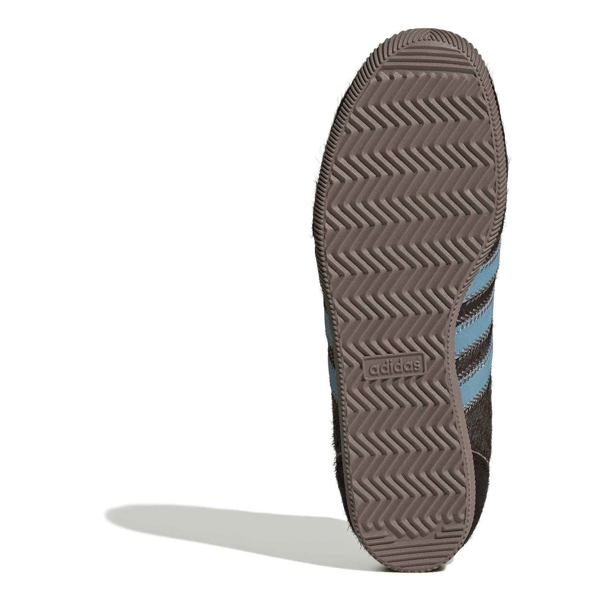 adidas Originals Japan sneakers outsole, dark rubber tread with blue stripe accent at side