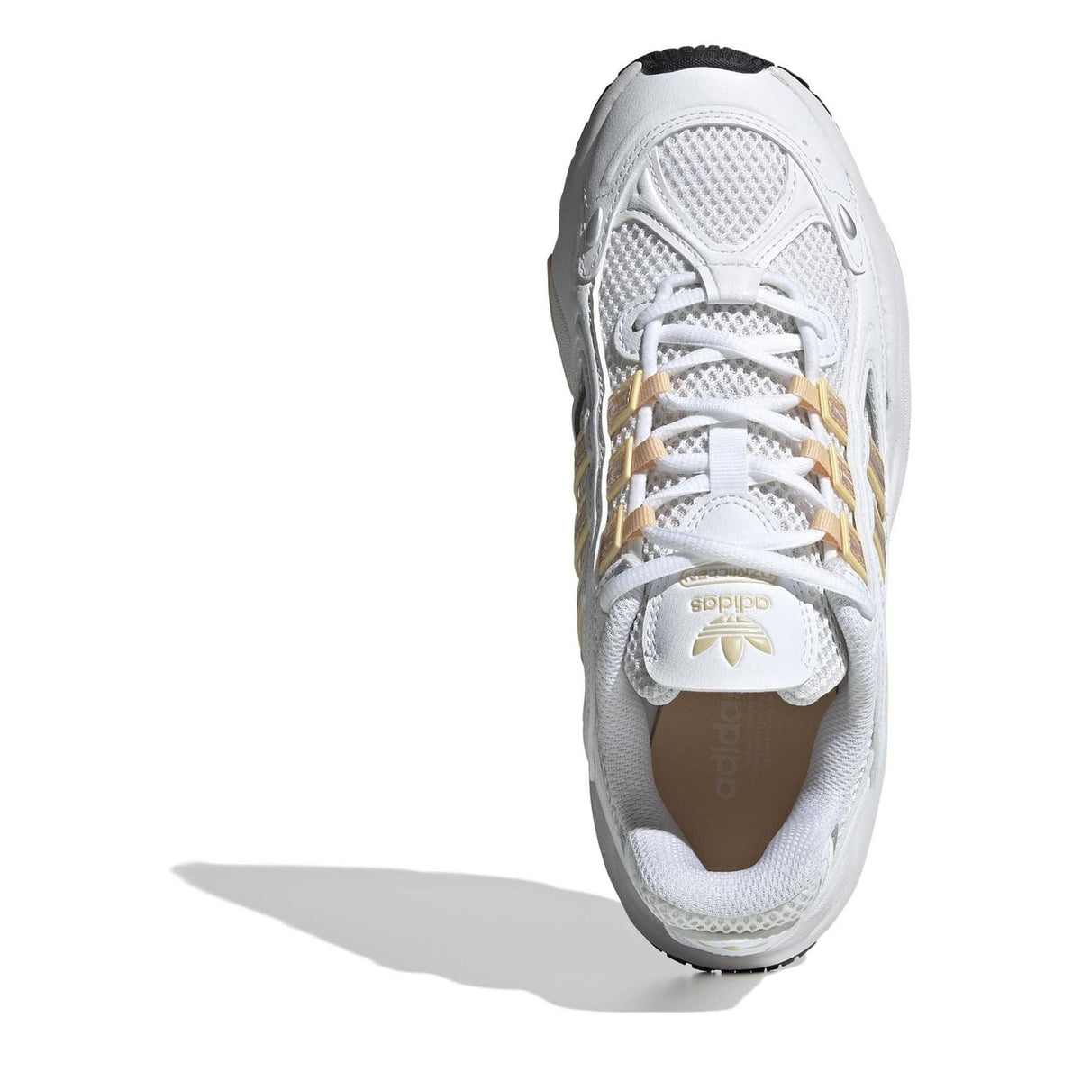 adidas Originals low-top sneakers, toe and laces view, white with gold detail branding
