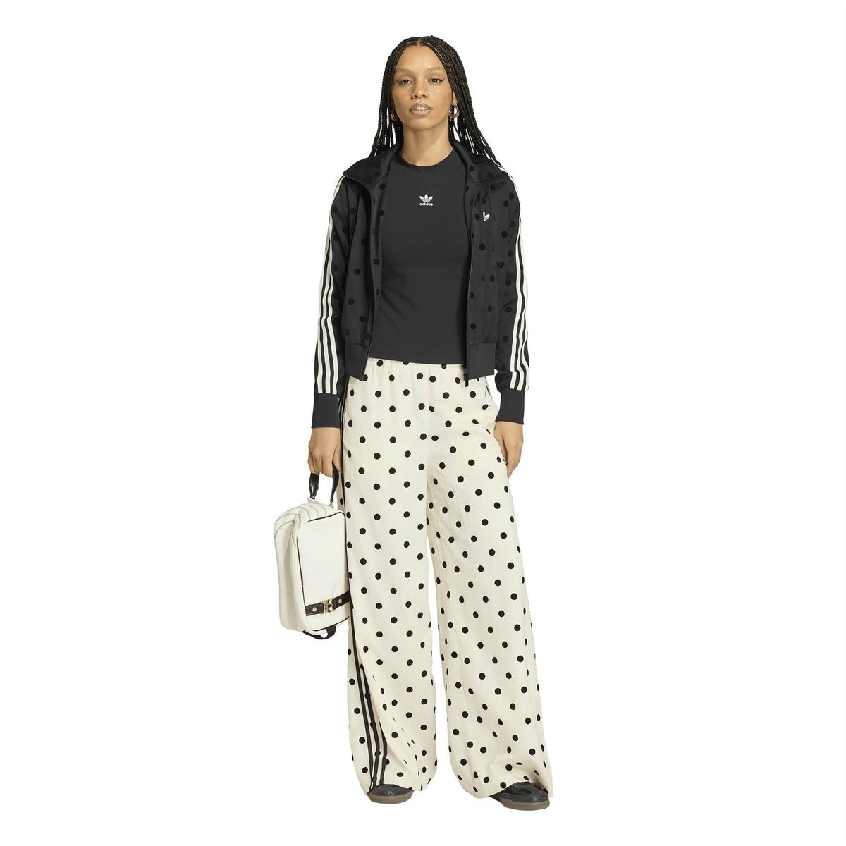 Off-white wide-leg elastic-waist pants with black polka dots and side stripe accents