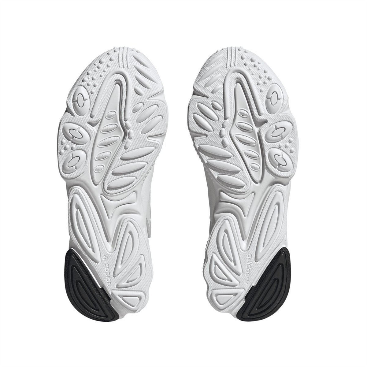 White adidas Originals trainers outsoles, textured tread with black heel patch