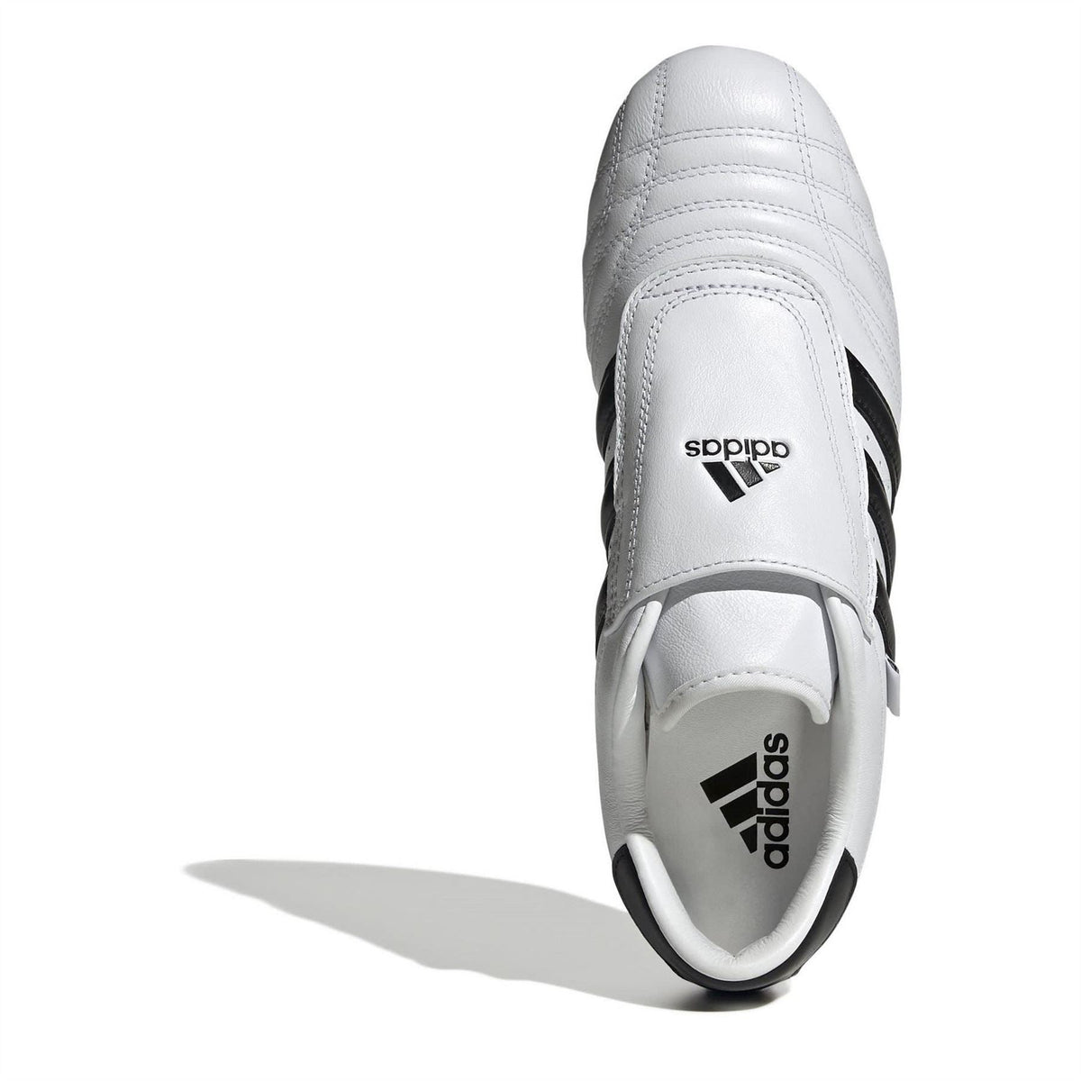 adidas Originals low-top trainers in white leather with black stripes and strap