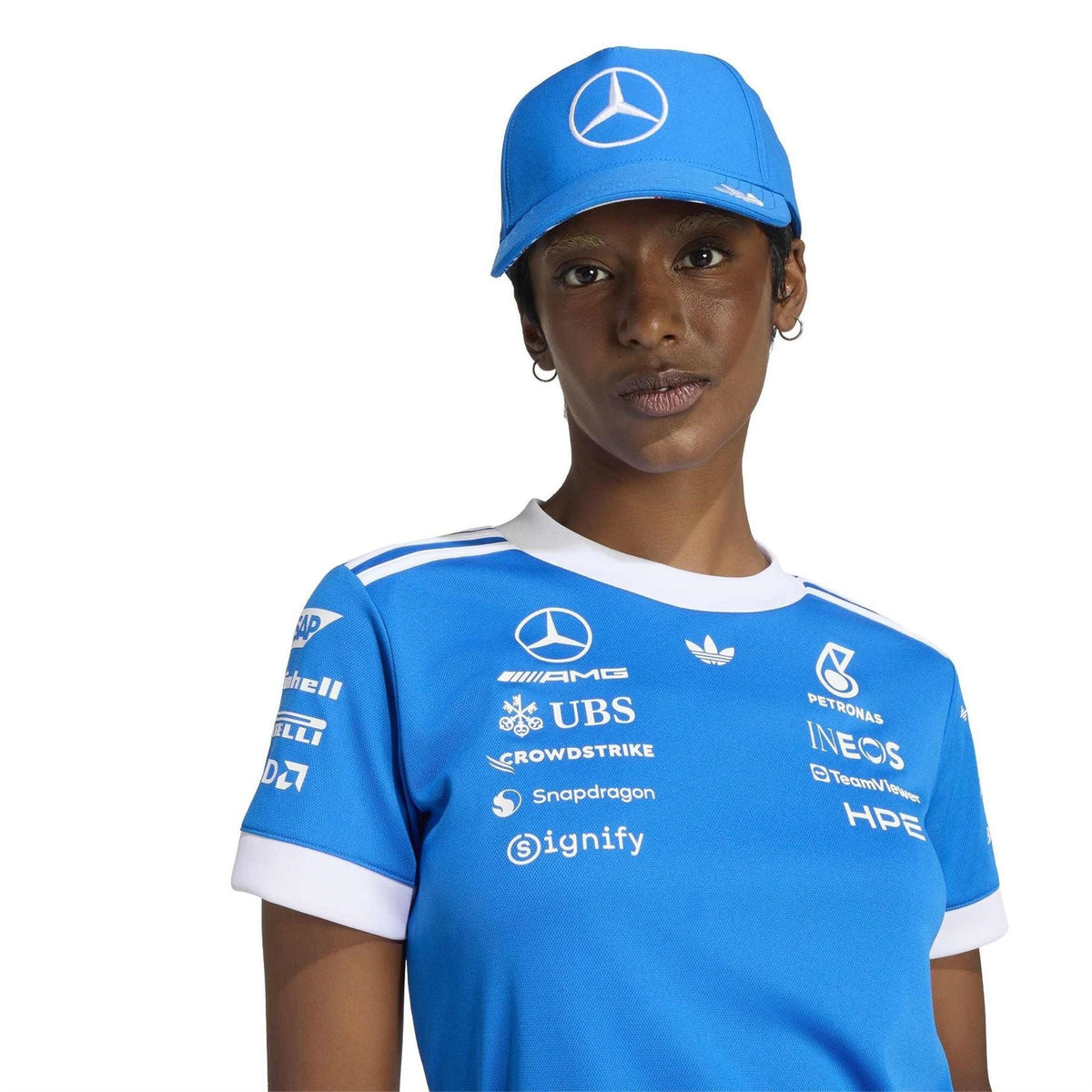 Blue crew-neck short-sleeve jersey with white trim and sponsor patches