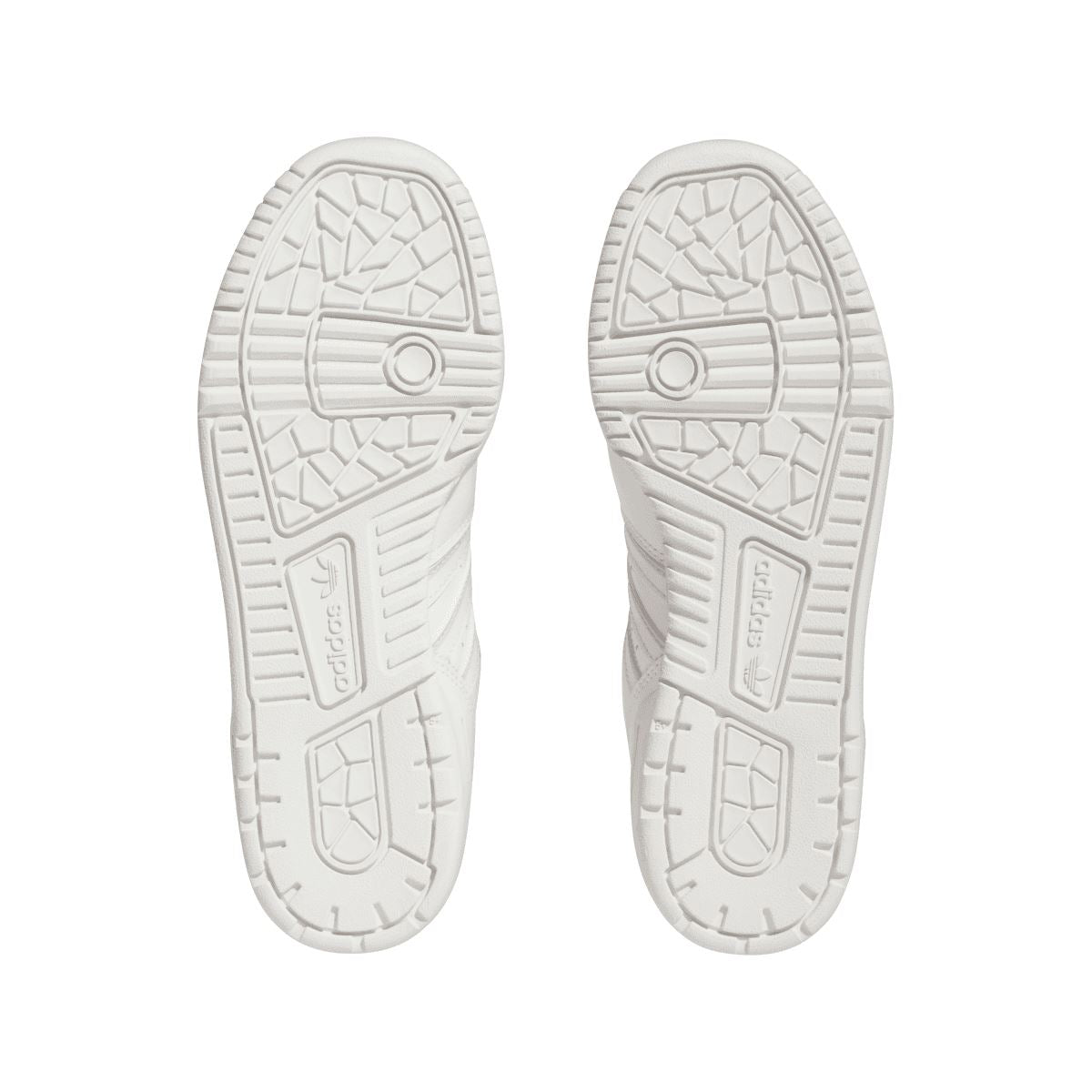 White rubber outsoles for low-top trainers with textured tread and brand embossing